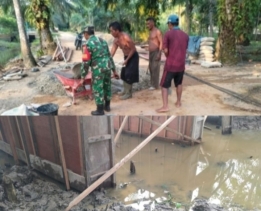 Satgas Kodim 0302/Inhu Bersama Warga, Bekerja Sama dalam Pembangunan Jembatan Garuda