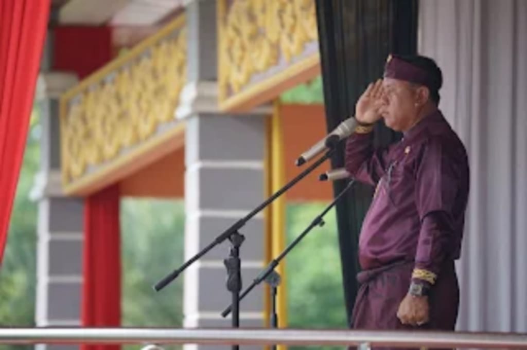 Upacara HUT ke-26 Tahun Kuansing,Bupati Tegaskan Perkuat Bangun Negri Adat ‎