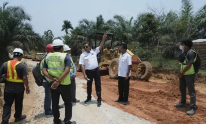 Terealisasi Pengaspalan Jalan Desan Sungai Langsat Menuju Desa Sako