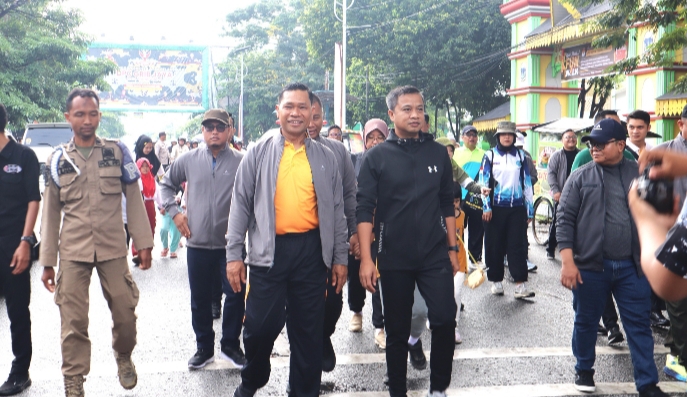 Sosialisasikan Pilkada Sukses, Pj Walikota Tebingtinggi Ikuti Fun Walk Bersama KPU dan Forkopimda