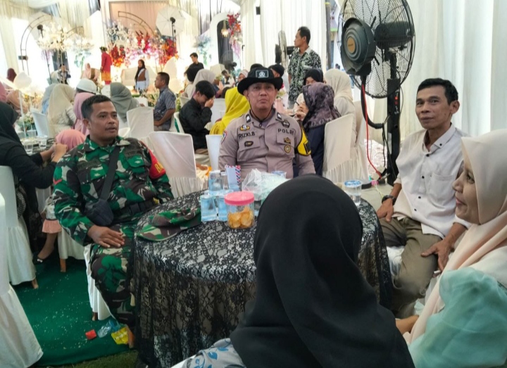 Dimanapun Tempat Sinergi Babinsa Dan Babhinkamtibmas Selalu Kompak Kali ini Hadiri Acara Resepsi Warga Binaan.